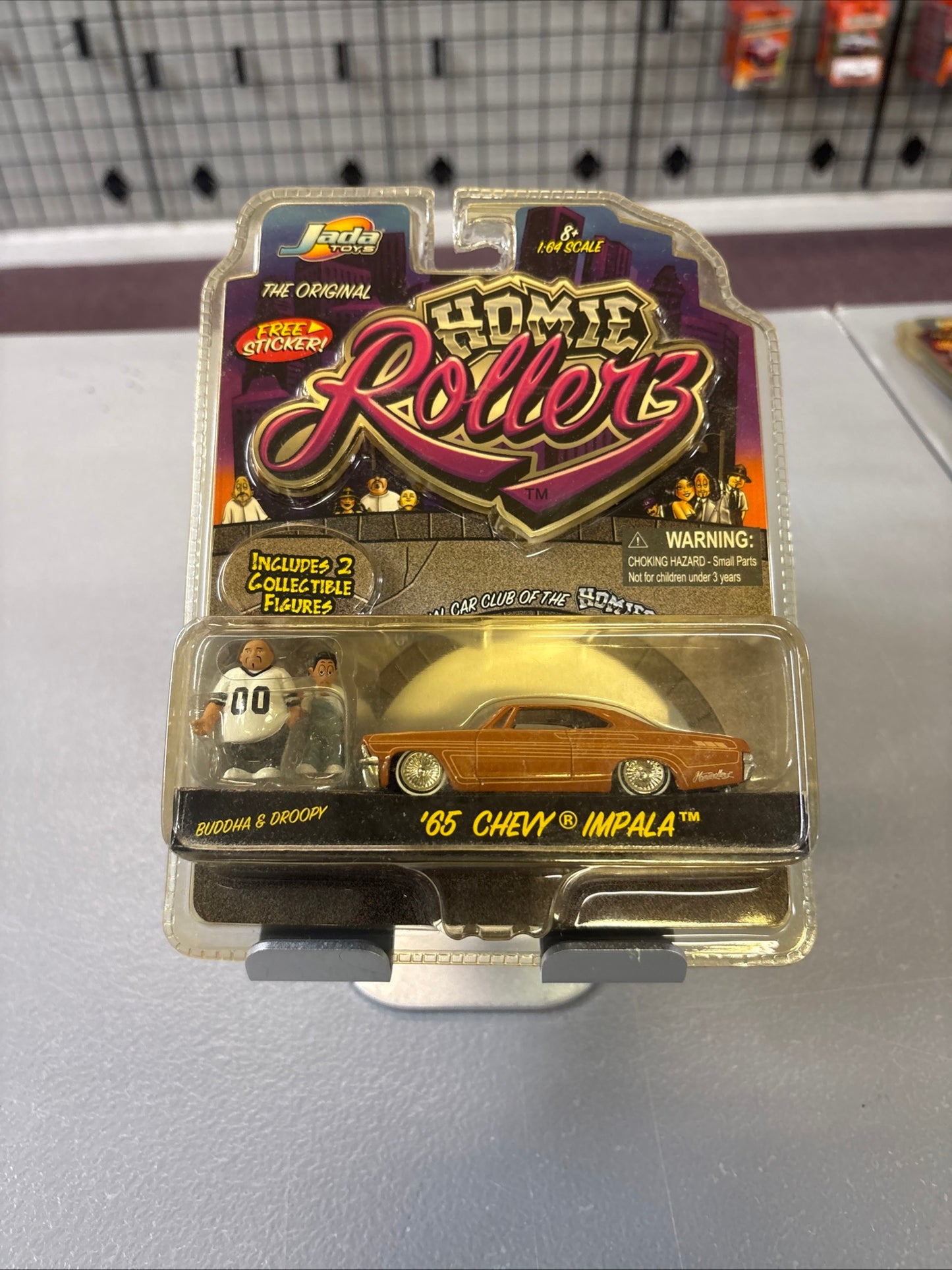 Jada Toys 1:64 Scale Homie Rollerz Car ‘65 Chevy Impala Buddha & Droopy